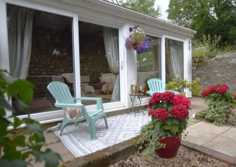 The terrace & outdoor sitting area at Tredinnick Farmhouse, Gummows Shop