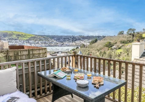 The decked terrace & alfresco dining area at Tree Tops, Kingswear