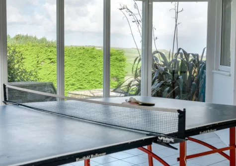 The conservatory with table tennis table at Trefebus, Constantine Bay