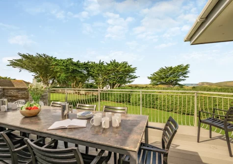 The large first-floor balcony, barbecue & alfresco dining at Trefebus, Constantine Bay