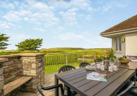 The large first-floor balcony, barbecue & alfresco dining at Trefebus, Constantine Bay