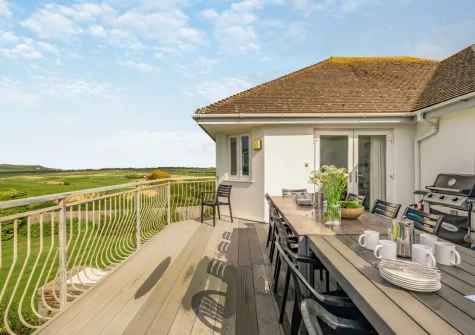 The large first-floor balcony, barbecue & alfresco dining at Trefebus, Constantine Bay