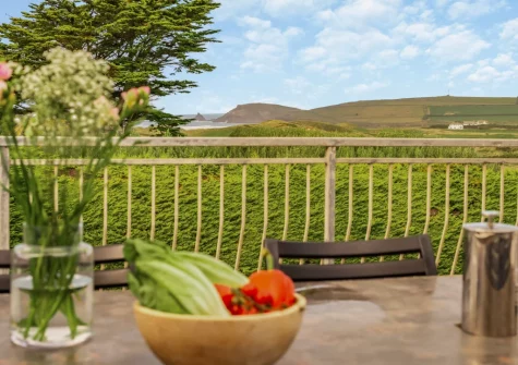 The large first-floor balcony, barbecue & alfresco dining at Trefebus, Constantine Bay