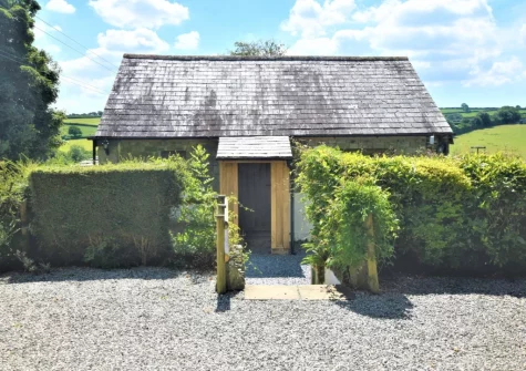 Trefrize is a hilltop barn conversion set within ten acres of countryside with far reaching views