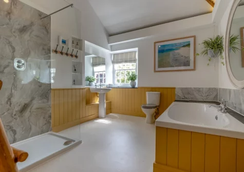 The upstairs shower room at Tregenna Farmhouse, Tredethy