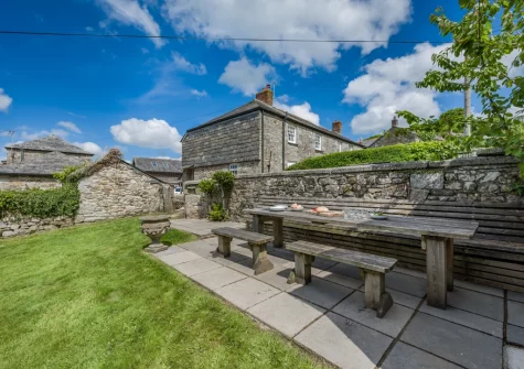 The private patio, barbecue & alfresco dining area at Tregenna Farmhouse, Tredethy