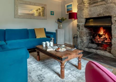Tregenna Farmhouse, Tredethy is a magnificent Grade II-listed five-bedroom country retreat set amid beautiful North Cornwall countryside, featuring twin open fires, a games room, generous gardens with barbecue, and easy access to coastal walks.