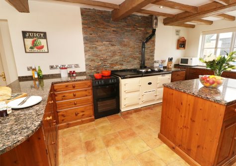 The kitchen at Tregoninny Vineyard and Woodland Farmhouse, Tresillion