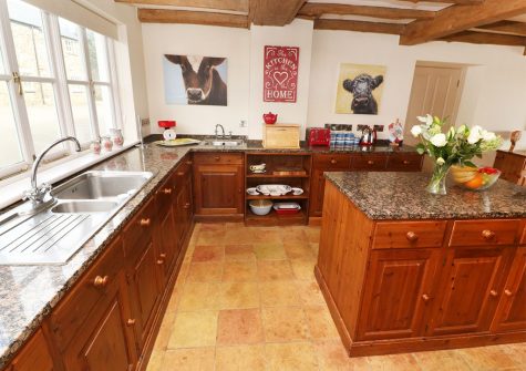 The kitchen at Tregoninny Vineyard and Woodland Farmhouse, Tresillion