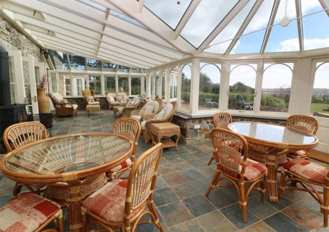 The conservatory at Tregoninny Vineyard and Woodland Farmhouse, Tresillion