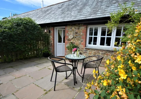 The patio & outdoor sitting area at Tregoose, Week St Mary