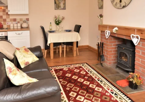Tregoose, Week St Mary is a characterful one-bedroom cottage set within the grounds of a 13th-century manor house, offering peaceful rural seclusion, direct access to stunning coastal walks, and a cosy wood burner for romantic escapes.