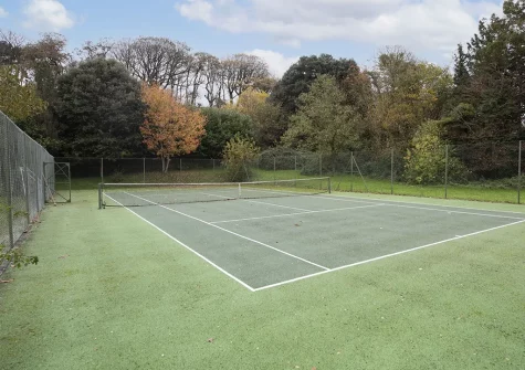 The tennis courts at Treharrock Manor, St Endellion