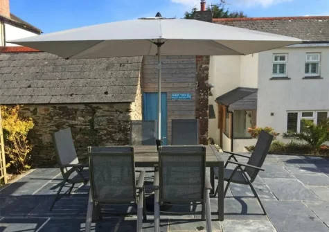 The patio & alfresco dining area at Trelan, St Ewe