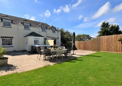 The patio, alfresco dining area & garden at Trelow Barton, Tredinnick