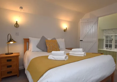 Bedroom #1 at Trelow Farmhouse, Tredinnick