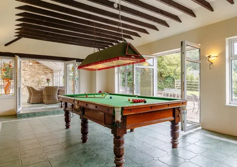 The games room at Trelow Farmhouse, Tredinnick