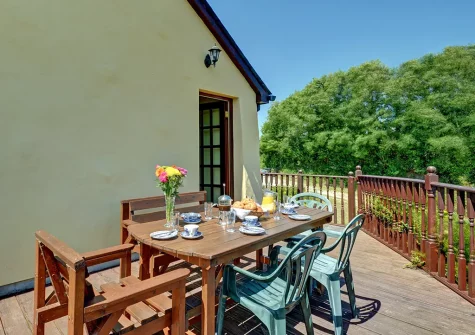 The decked terrace & alfresco dining area at Trembleath Parlour, St Mawgan