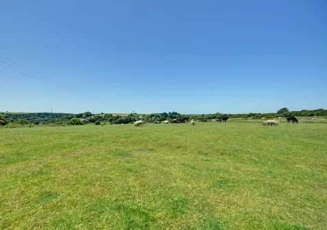 The view from the decked terrace & alfresco dining area at Trembleath Parlour, St Mawgan