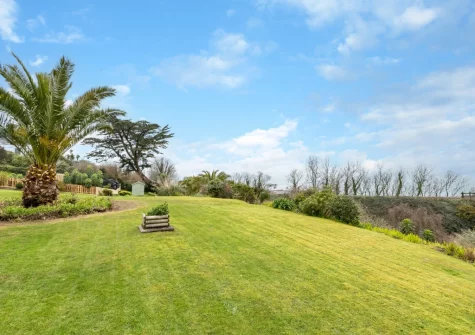 The shared lawned garden at Trenance at 2 Godrevy Court, Carbis Bay