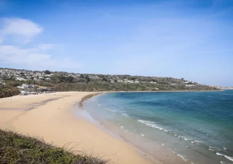 Carbis Bay Beach is a pristine crescent of golden sand, known for its calm & clear waters.