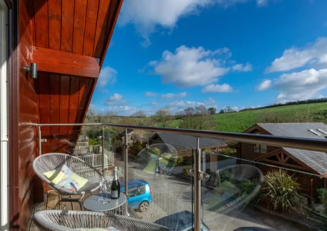 Bedroom #1 balcony & outdoor sitting area at Trenant, Little Petherick