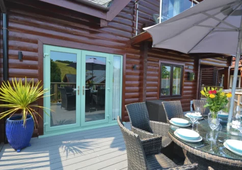 The decked patio & alfresco dining area at Trenant, Little Petherick