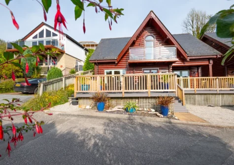 Trenant is a characterful four-bedroom Canadian log home with timber walls & ceilings