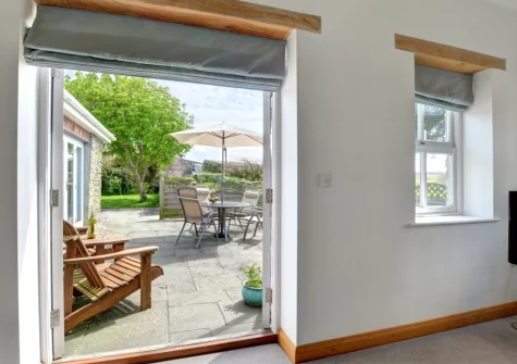The patio, outdoor sitting & alfresco dining area at Tresallyn Cottage, St Merryn