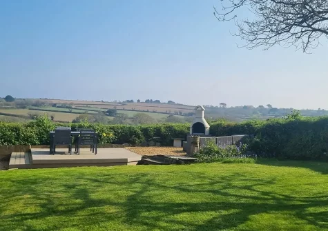 The decked patio, barbecue, alfresco dining & outdoor sitting area at Trescore, Treworthal
