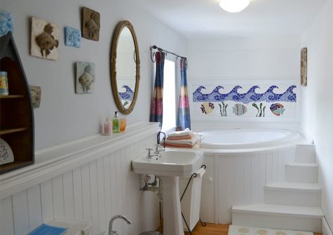 The bathroom with jacuzzi bath at Trescowthick Barn, St Newlyn East