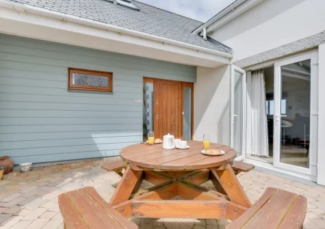 The patio & alfresco dining area at Trevalga, Porthcothan Bay