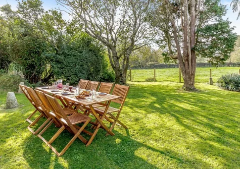 The garden & alfresco dining area at Trevallack House, St Keverne