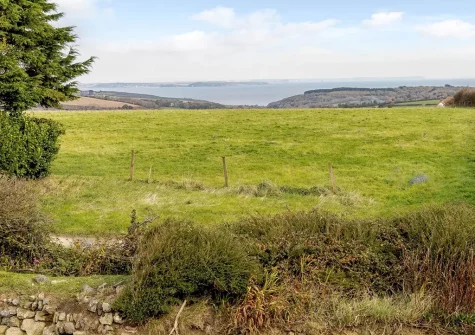 Enjoy sea views from the garden when you stay at Trevallack House, St Keverne