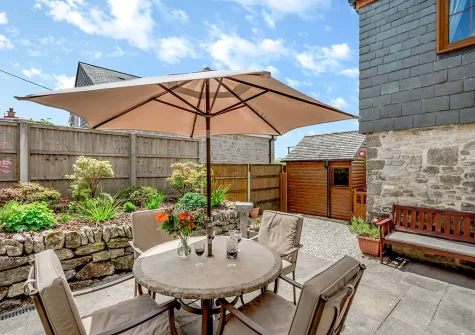 The enclosed patio garden & alfresco dining area at Trevean, St Breward