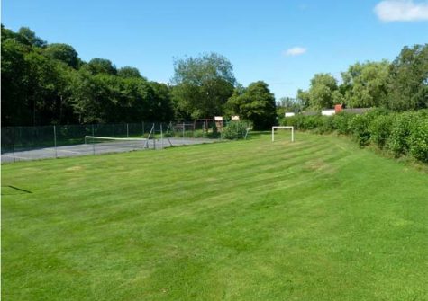 The shared tennis, badminton & children's play area at Trevellard Belle, Notter