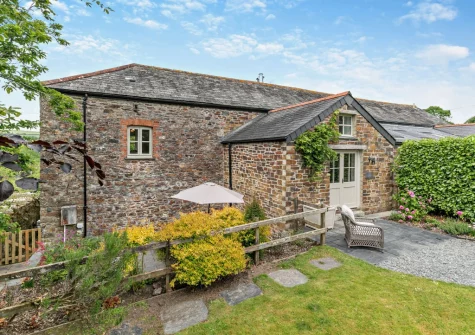 The secluded paved terrace & garden at Treverran Stables, Fowey