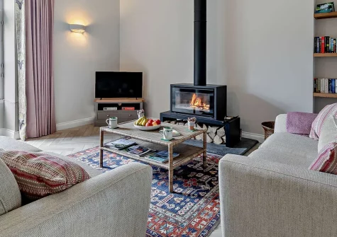 Treverran Stables, Fowey, is a characterful two-bedroom barn conversion blending rural tranquillity with coastal access. Enjoy a reverse-level layout, wood burner, and sun-drenched south-facing garden, perfect for memorable Cornish getaways.