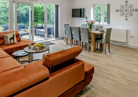 Trevone, Mawgan Porth is a tranquil four-bedroom retreat with accessible design, private fishing lake, and scenic woodland path to beautiful Mawgan Porth Beach. Perfect for families seeking unforgettable coastal adventures and peaceful relaxation.