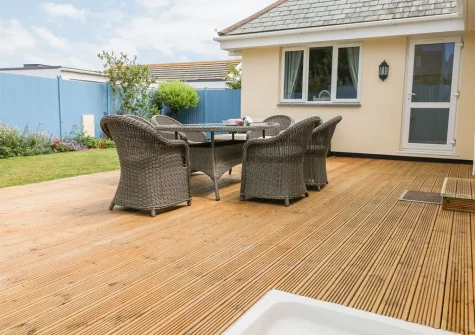 The patio, alfresco dining & barbecue area at Trevose House, Crantock