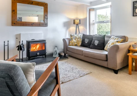 Trevow, Pendeen is a beautifully restored three-bedroom cottage in this quiet former mining village on Cornwall's dramatic Tin Coast, featuring a wood burner, garden terrace, and easy access to spectacular coastal walks and World Heritage sites.