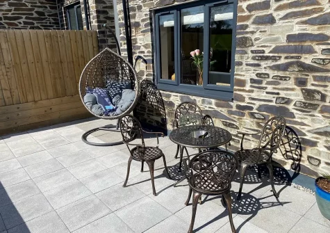 The front patio & outdoor sitting area at Trewhiddle House, St Austell