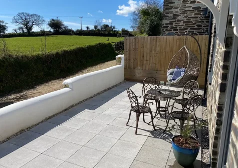 The front patio & outdoor sitting area at Trewhiddle House, St Austell