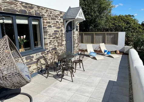 The front patio & outdoor sitting area at Trewhiddle House, St Austell