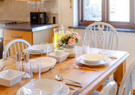 The dining area at Trewillis Farm Rose Barn, Coverack