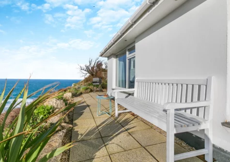 The patio & outdoor sitting area at Trewollas Beach Cottage, Sennen