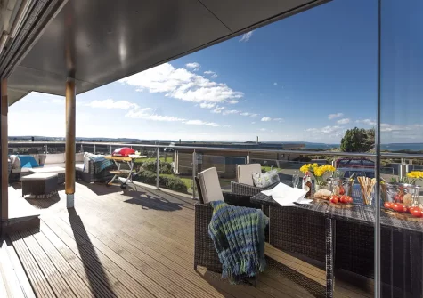 The decked balcony & alfresco dining area at Triskel, Morcliff, St Agnes
