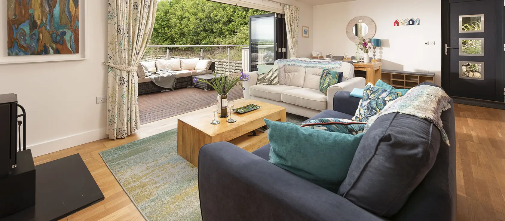 Triskel, Goonvrea is a charming two-bedroom lodge with spectacular ocean views towards St Ives. Enjoy contemporary comfort, wood-burning stove, private deck with barbecue, and coastal walks from this peaceful eco-friendly Cornwall retreat.