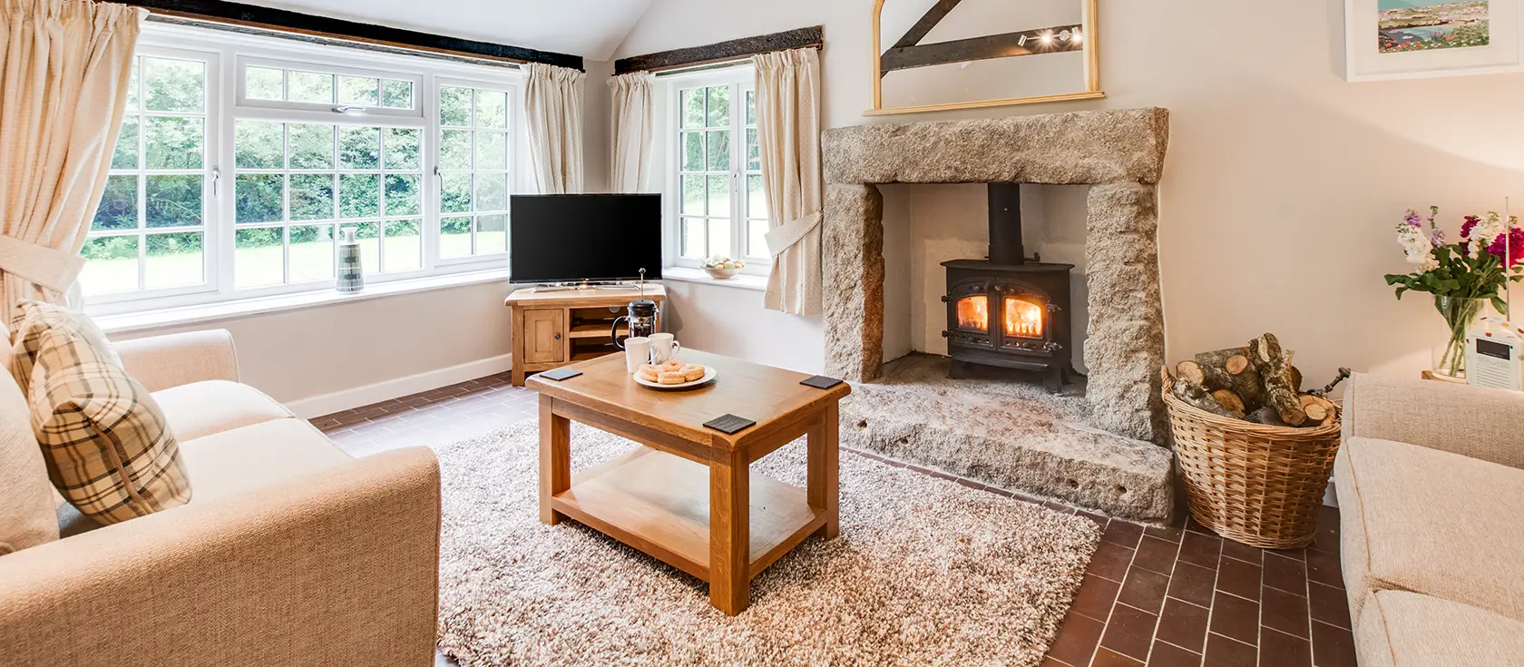 Troutstream, St Breward is a secluded stone cottage nestled in magical woodland surroundings. This charming two-bedroom retreat offers stylish interiors, a stream-side garden, and easy access to Cornwall's most captivating attractions and landscapes.