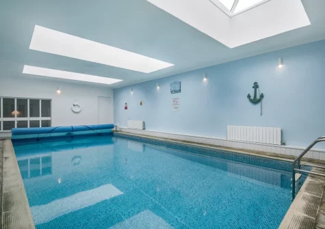 The indoor heated swimming pool at Tumbles Lodge, Hersham
